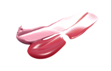 Red and pink lip gloss isolated on white 
