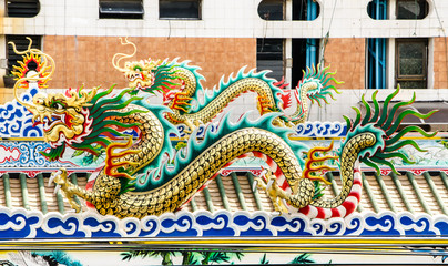 Dragon statue on the roof Chinese temple