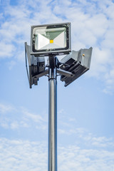 Lamp post against blue sky