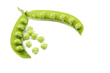 Green peas on a white background.