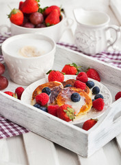 Cheese pancakes with fresh berries
