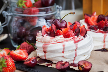  Pavlova meringue cake with fresh strawberry and cherry