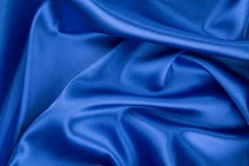 Some folds of blue silk cloth.