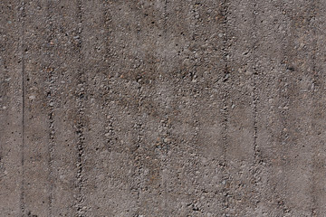 Grungy and smooth bare concrete wall