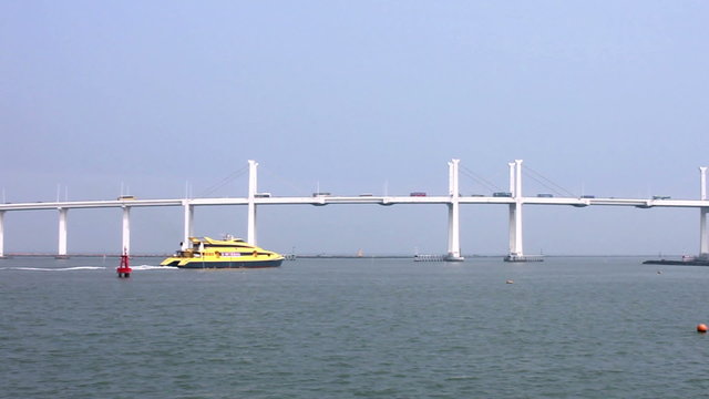 Jetfoil sailing under the Friendship bridge, from Macau to Hong Kong