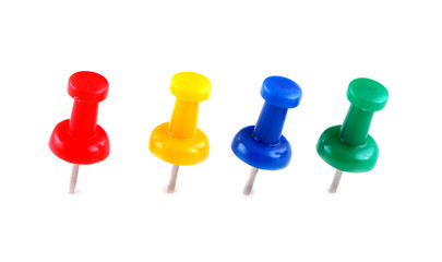 colorful pushpins on white background