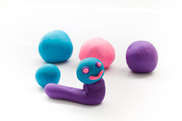 plasticine of worm shape on white background