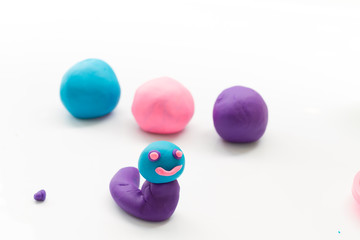 plasticine of worm shape on white background