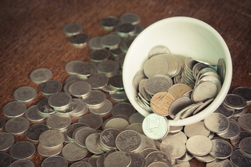 Coin in the cup with filter effect retro vintage style