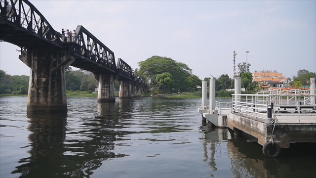 Kwai river bridge,with tourism walking on , and pier 