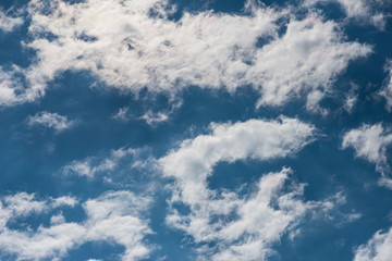 Dramatic sky with white clouds.