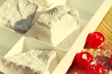 Rahat-lokum and fresh berries of cherry