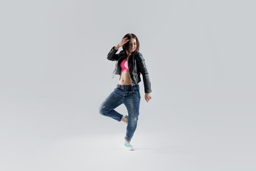 young woman hip hop dancer, in the Studio on a white background
