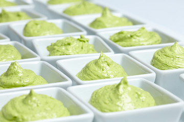 butter mixed with herbs in small plates at the buffet