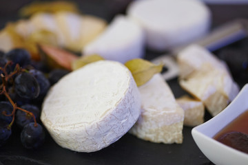 set of ingredients: cheese, olives, berries, sauces, snacks