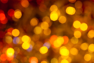 dark brown, yellow and red twinkling lights - obrazy, fototapety, plakaty
