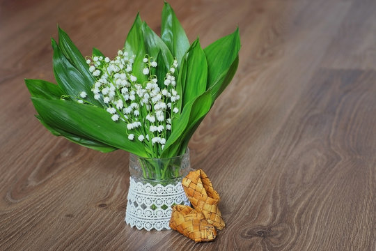 composition bouquet of lilies of the valley lace