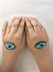 Blind reading text in braille