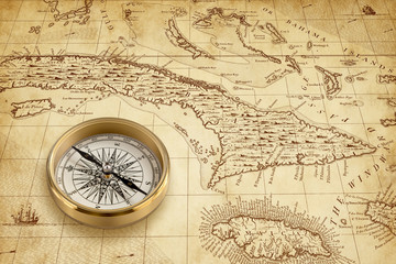 Fototapeta na wymiar Old Pirate Map with Brass Compass