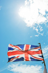 The Union Jack, the national flag of the United Kingdom waving on wind