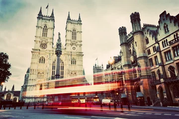 Foto op Plexiglas Westminster Abbey church, red bus moving in London UK. Vintage © Photocreo Bednarek