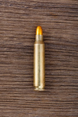 Ammunition, on the wooden table, close-up.