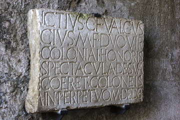 Inscription on the stone at Pompeii ruins