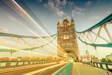 Fototapeta na wymiar Bus light trails across Tower Bridge, London