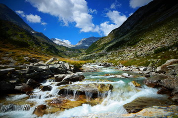 Fototapeta na wymiar Wasserfall / Bachlauf in den Bergen