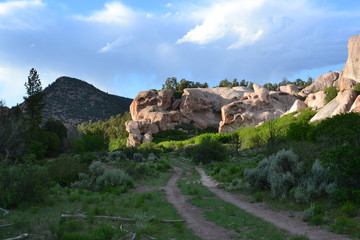 Fototapeta na wymiar Rural path to rock formation