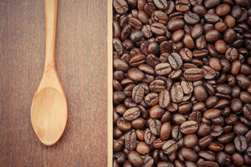 Coffee beans and wooden spoon with filter effect retro vintage s