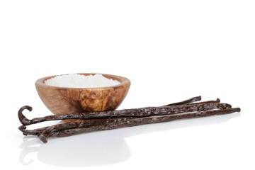fresh bourbon vanilla pods and sugar, isolated on white