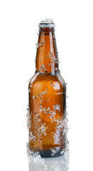 Beer bottle with ice and condensation on white background - obrazy, fototapety, plakaty