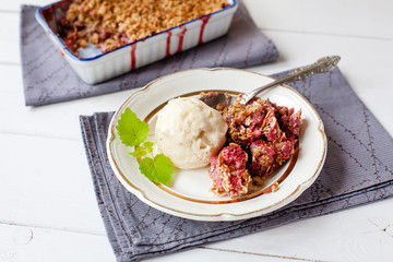 homemade strawberry crumble with ice-cream (healthy breakfast)