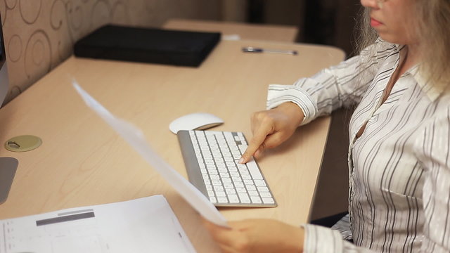 Business Girl analyzing investment charts