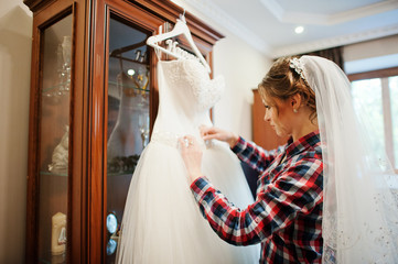 Bride with her wedding dress