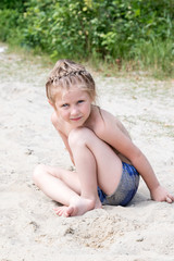 Little girl on the sand