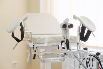 Gynecological chair in gynecological room