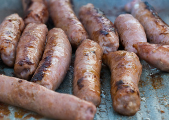 Cooking sausages close-up