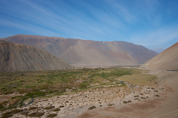Pan American Highway (Route 5) running south to north for over 3000 km through Chile as it passes through the valley of the Rio Camarones in the Atacama Desert close to Arica in northern Chile.