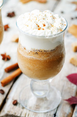 Obraz na płótnie Canvas pumpkin spice frappuccino with whipped cream