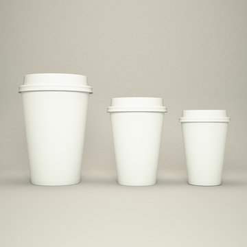 Three paper coffee cups