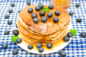 pancakes with berries and honey