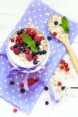 yogurt with berries and oat flakes