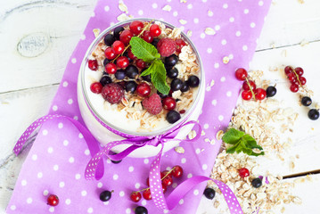 yogurt with berries and oat flakes