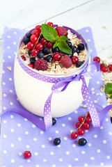 yogurt with berries and oat flakes