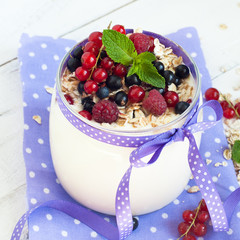 yogurt with berries and oat flakes