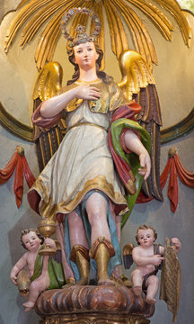 CORDOBA, SPAIN - MAY 26, 2015: The carved and polychrome statue of archangel Raphael in Church Eremita de Nuestra Senora del Socorro on side altar by Alfonso Gomes de Sandoval from 17. cent.
