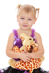 Adorable little blonde girl with pigtails on her head 