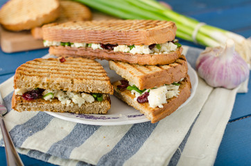Sandwich with blue cheese and cranberries